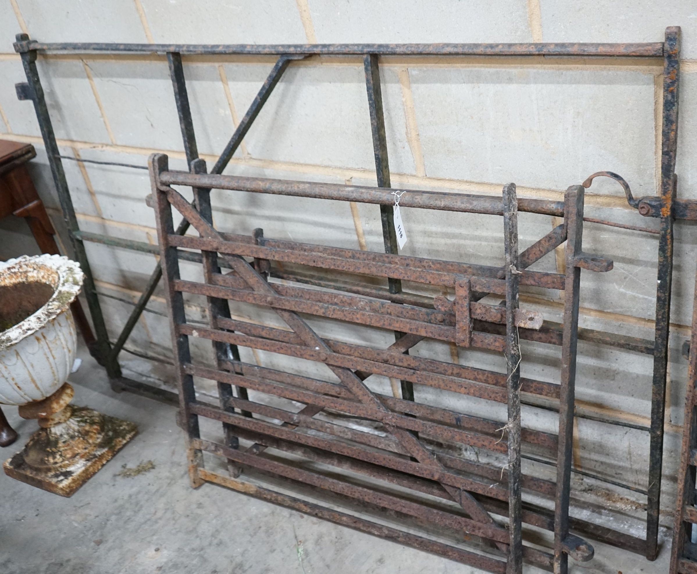 Three wrought iron garden gates, largest width 160cm, height 100cm